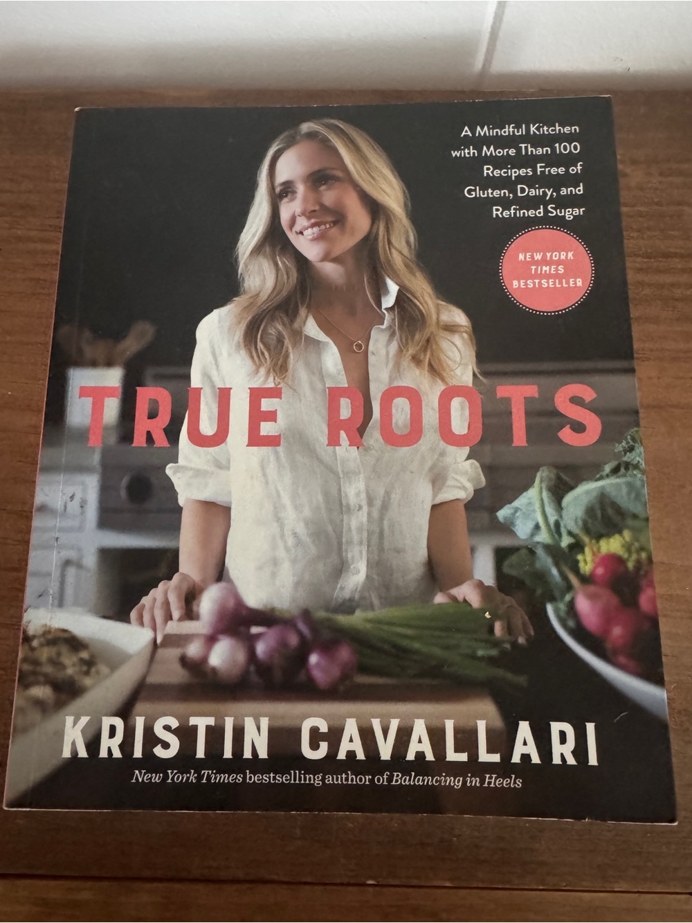 True Roots by Kristin Cavallari - Cookbook with Red Title